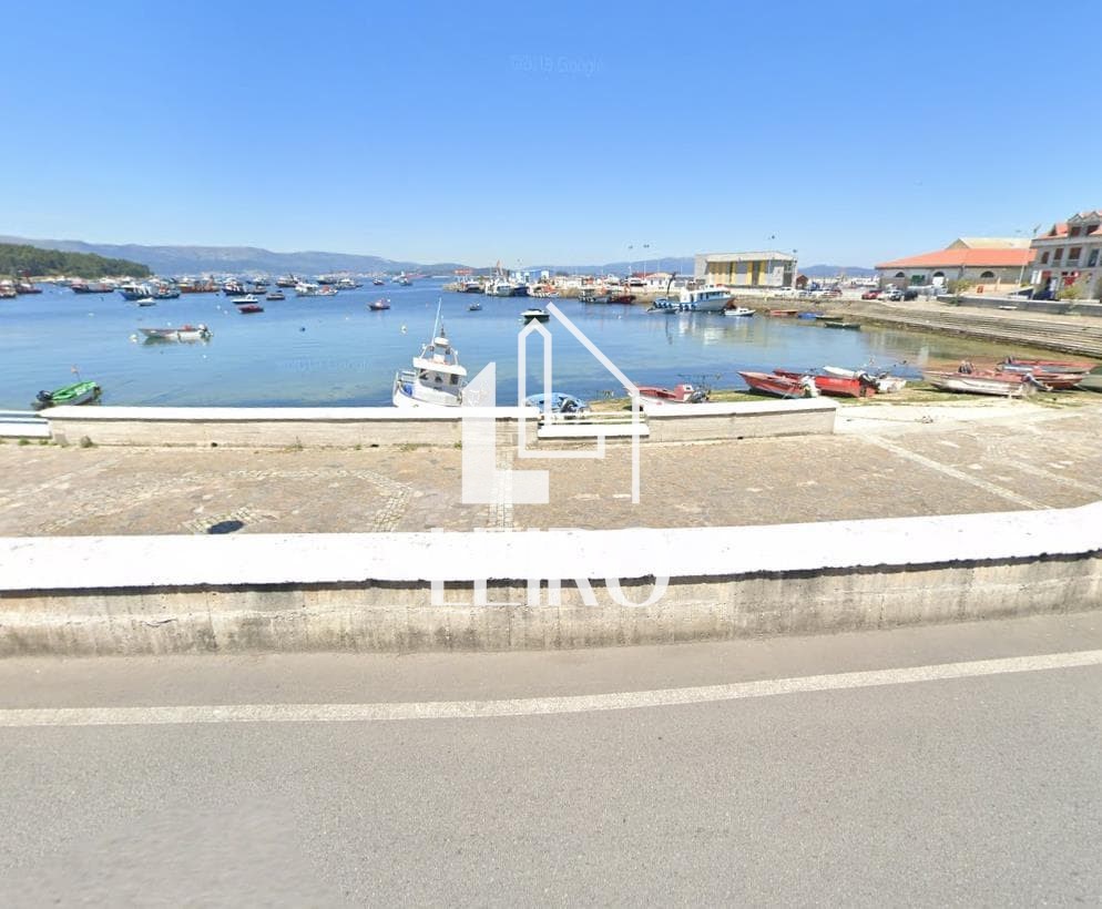 Foto 2 Casa en Primera Línea de Mar con Bajo Comercial