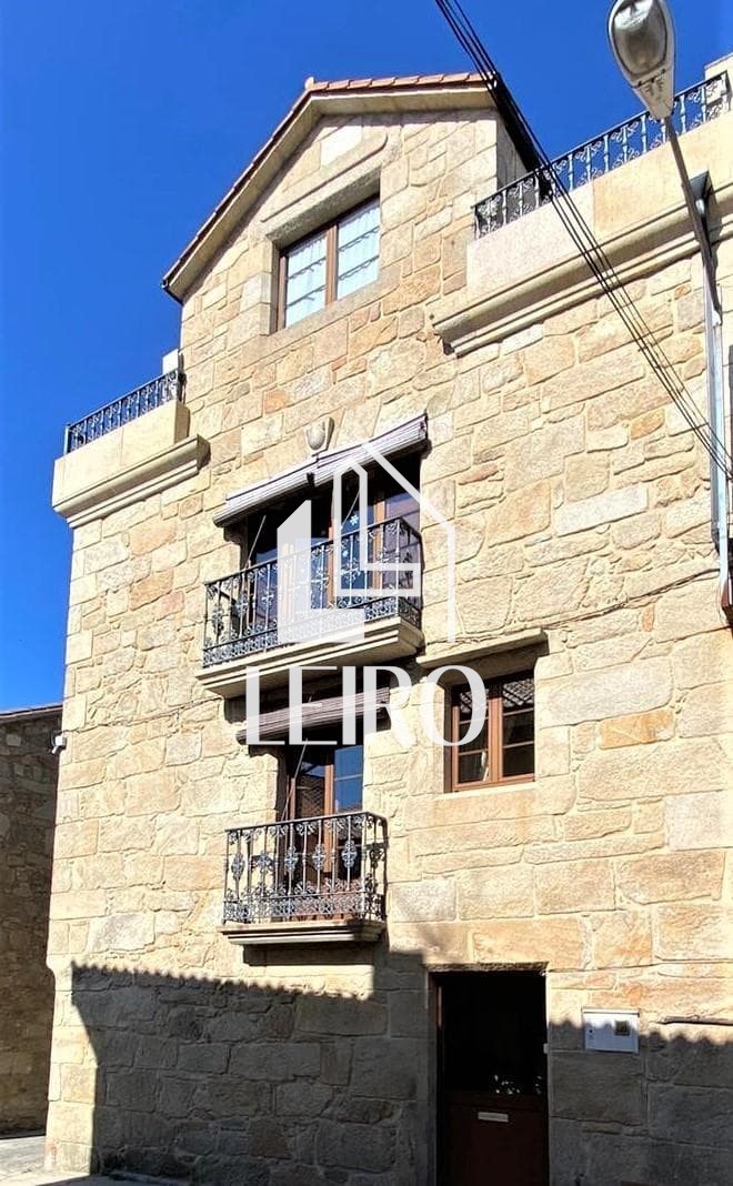 Foto 1 Casa Gallega de Piedra en la Playa